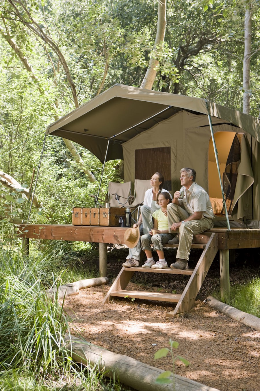 Family enjoying safari tent